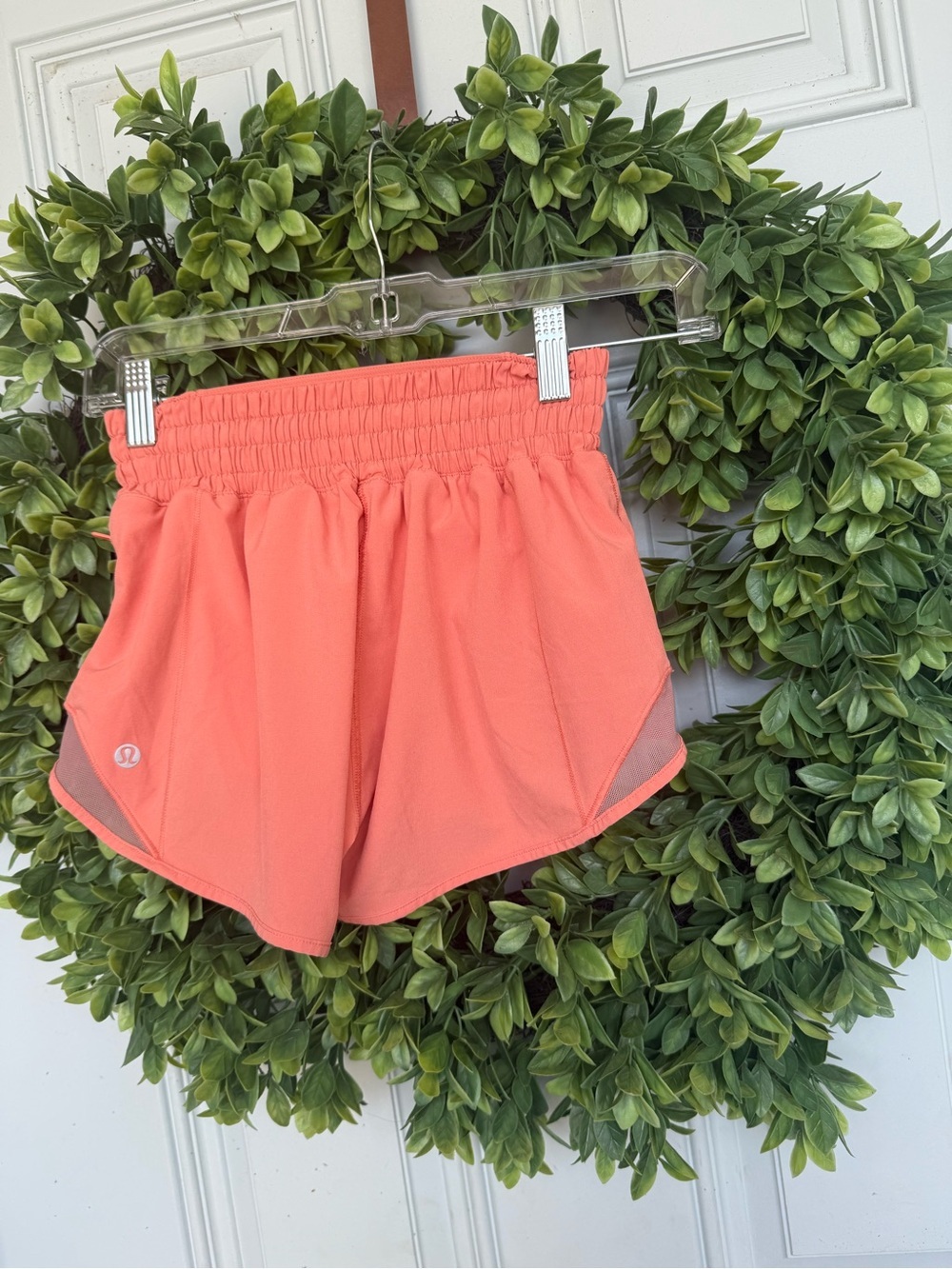 Lululemon Hotty Hot Shorts in a vibrant coral color - Picture 2 of 4